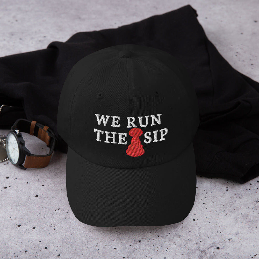 We run the sip hat / We run the sip Dad hat